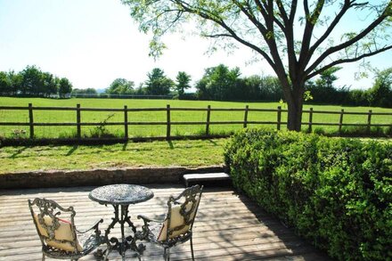 Attractive stone barn conversion with private garden