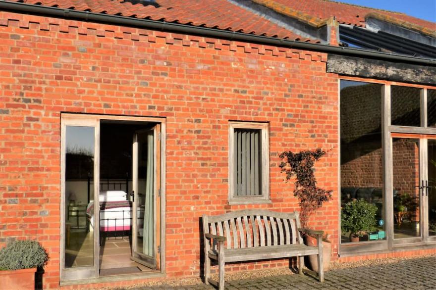 The Dairy is a simply stunning conversion of a traditional Norfolk barn