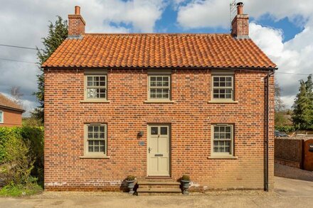 Elegant double fronted village house styled with uber relaxing interiors