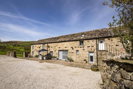 Beckside is a beautifully presented, Grade II listed three-bedroom cottage, bursting with character