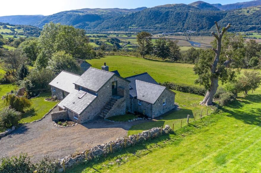 A recently converted barn that sits high above the beautiful Conwy Valley.