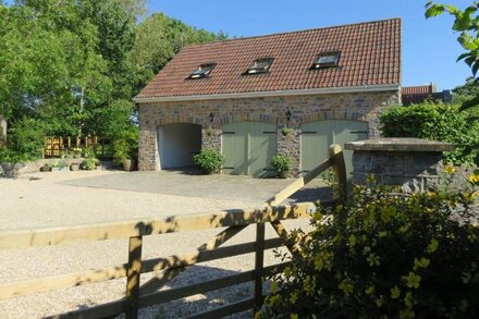 Family friendly accommodation overlooking stream and beautiful garden