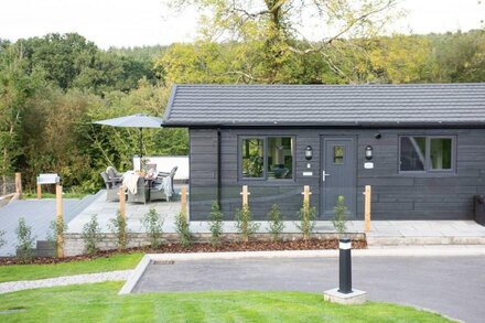 A contemporary lodge with private hot tub sleeping 9