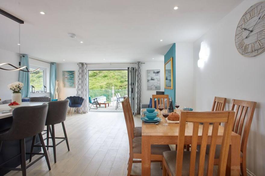 Anneth Lowen is a large four-bedroom detached house, just a short stroll from the bustling beaches o