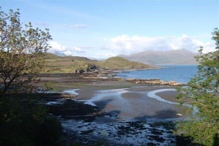 Charming property overlooking beach at Knock Bay and beyond to Knoydart