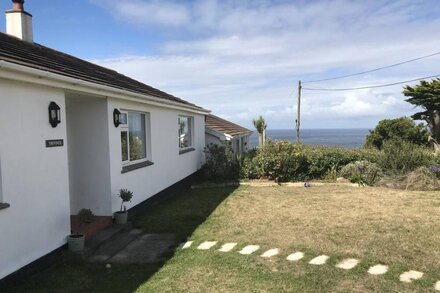 Trevince, a charming bungalow in Sennen Cove with amazing sea views.