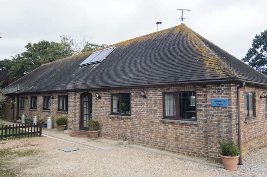 A spacious peaceful single-storey house within a private rural Wealden estate
