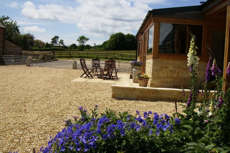 Light and spacious barn conversion on working farm in the Cotswolds