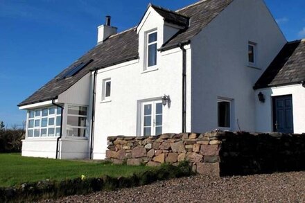 Elegant and secluded cottage with stunning views of the Summer Isles