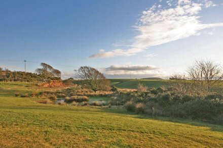 Luxury lodge situated idyllically on the edge of a small working farm