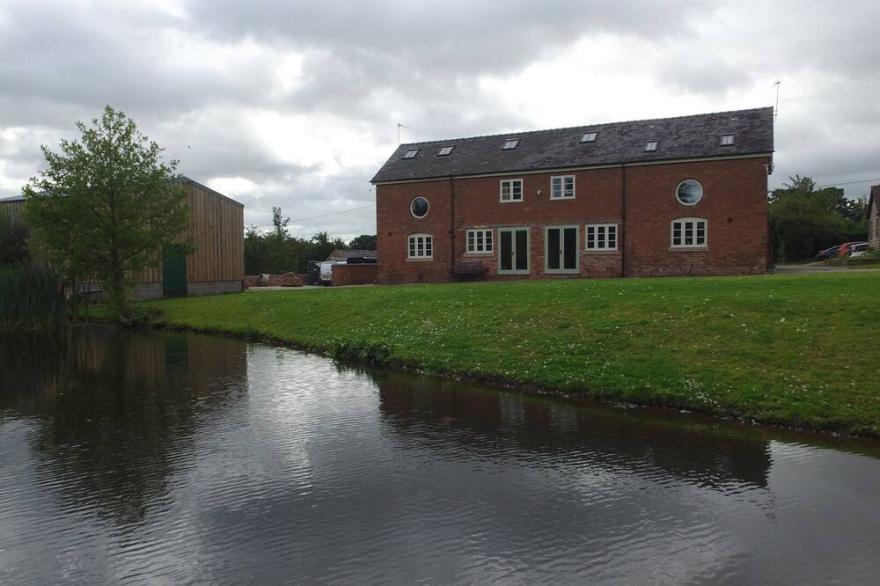 Spacious comfortable converted barn with character in peaceful surroundings.