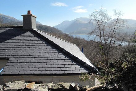 Traditional stone built cottage with fantastic view of lake and mountains