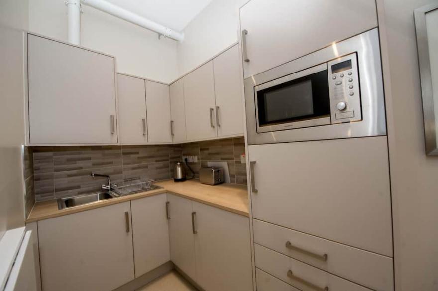 The James Suites deluxe suite with Kitchen.