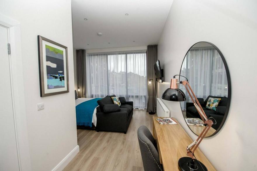 The James Suites deluxe suite with Kitchen.