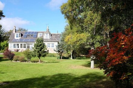 Beautiful spacious house and sun-porch in large mature gardens facing South