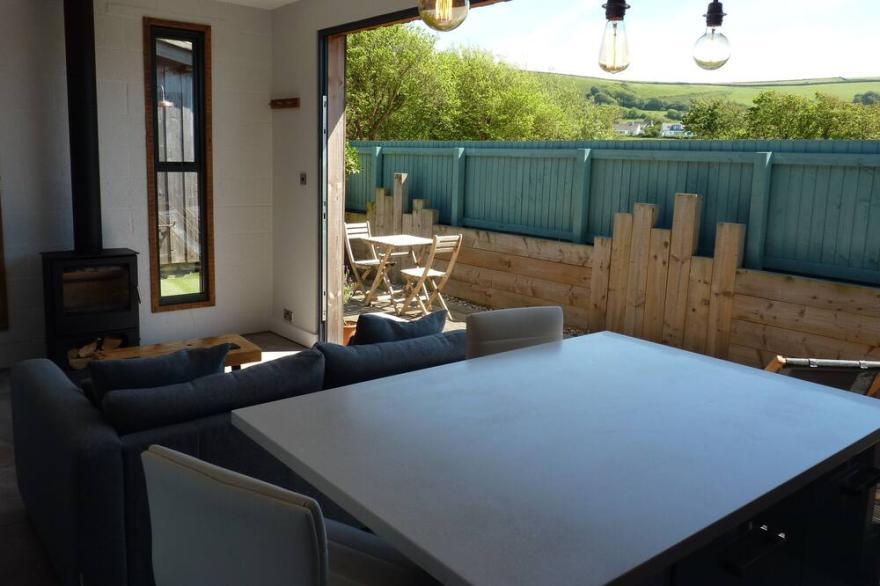 Board Room @ Green Rooms, a contemporary and spacious one bedroom apartment