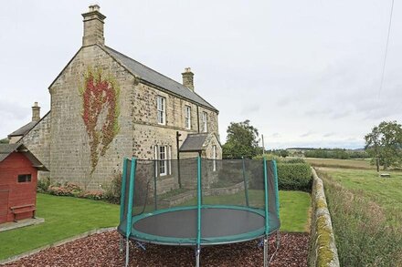 Large farmhouse with valley views in rural setting