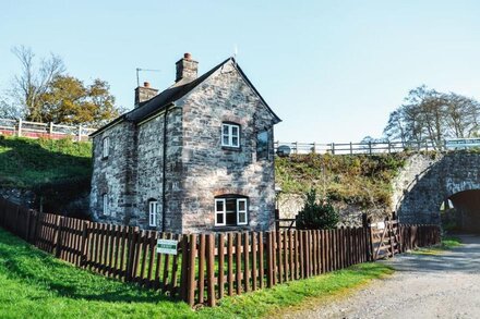 A canalside cottage, within Goytre Wharf on the Monmouthshire & Brecon Canal