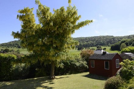 Beautiful family house with pool and views over golf course and South Downs