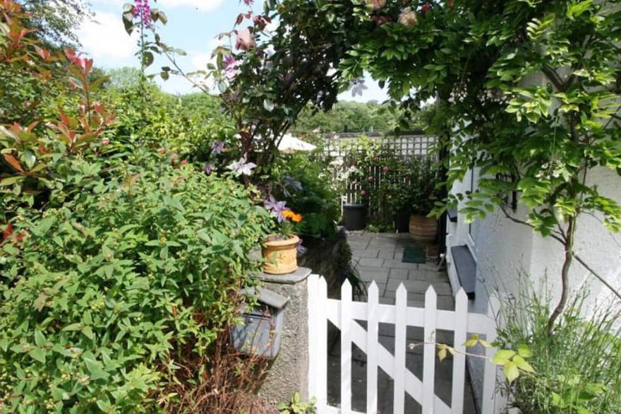 Hollyhocks Cottage is a semi detached country cottage in the hamlet of Helland Bridge on the Camel trail