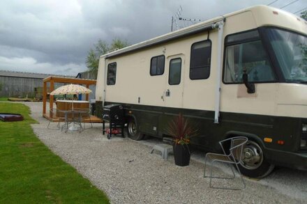 classic 80,s american winnebago camper with hot tub