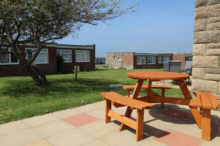 Cosy self Catering Bungalow with country & sea views.