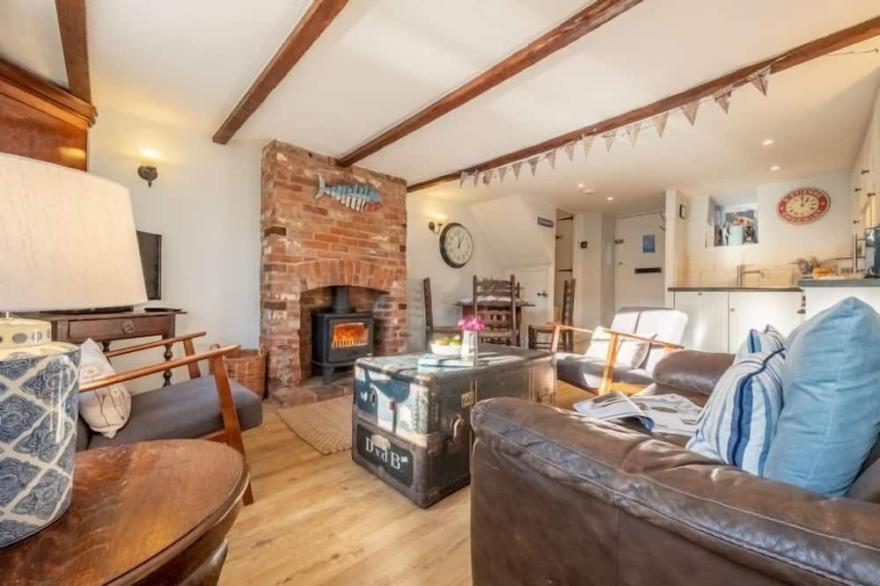 A gorgeously romantic old fisherman's cottage, tucked away in a quiet loke.