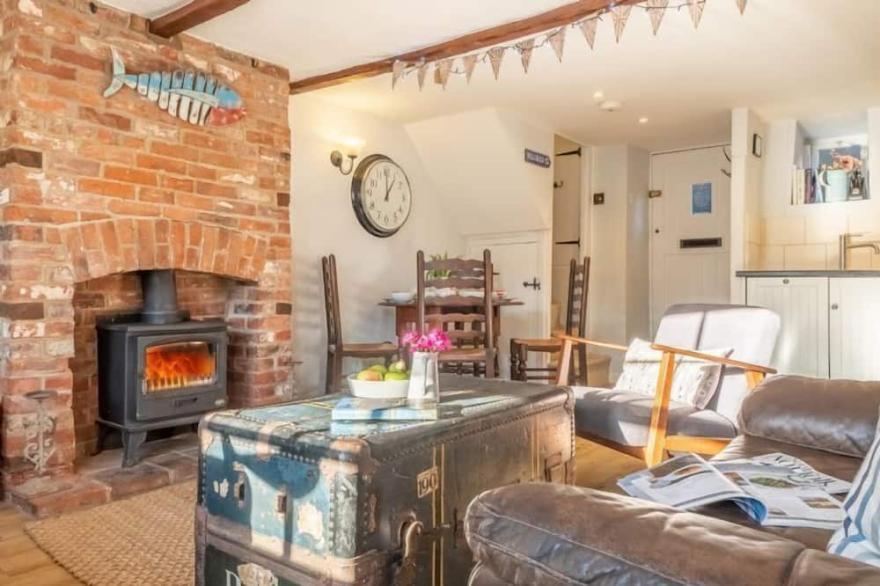 A gorgeously romantic old fisherman's cottage, tucked away in a quiet loke.