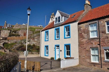 A beautiful 4 bedroomed house next to the harbour with fabulous gardens