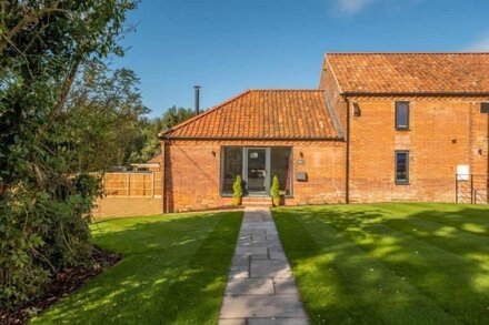 A beautiful mid-19th Century converted barn with a fully modernised interior which retains much of t