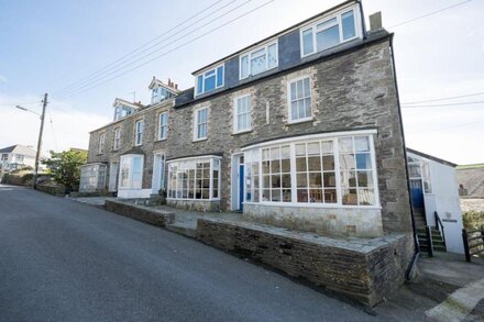 A beautiful, double-fronted terrace house situated in Port Isaac.