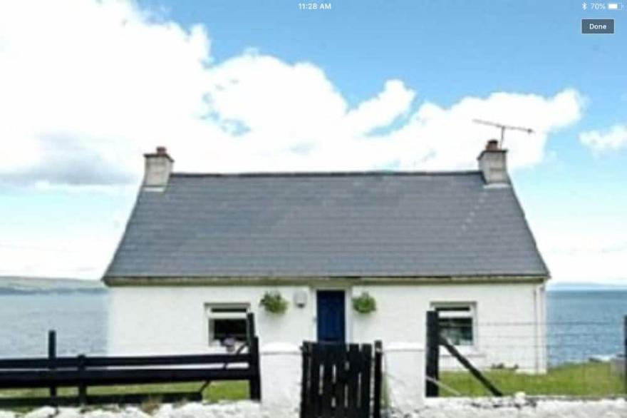 Coastal cottage , historic and award winning, absolute ocean front rural glens