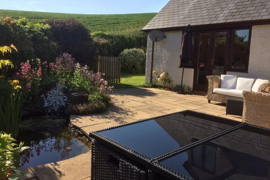 Family House in the country with lovely views and wood fired hot tub