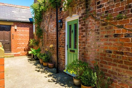 Cottage in village location with lovely views to the Hambleton Hills and White H