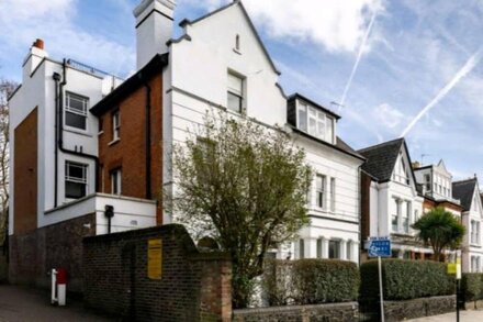 Duplex Apartment with roof terrace in quiet tree lined street.