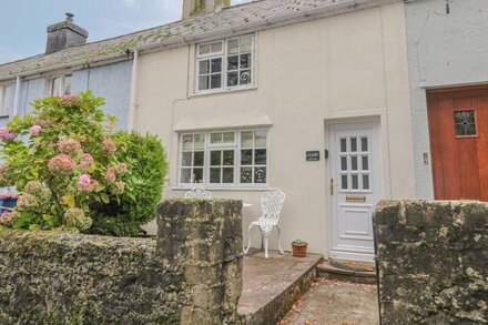 TY COED, character holiday cottage, with open fire in Beaumaris