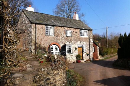 Parsonage Farm Stables, with stunning views down to the sea