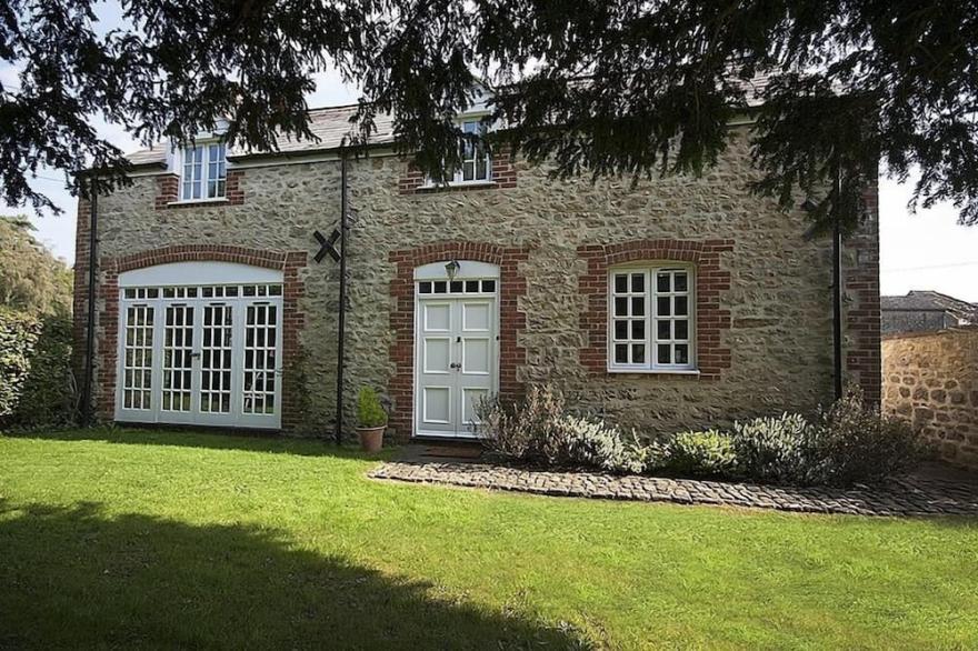 16th Century Coach House Located Within Beautiful Gardens