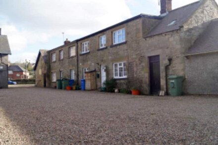 'The Stables'. A lovely stone built cottage in the small village of Powburn.