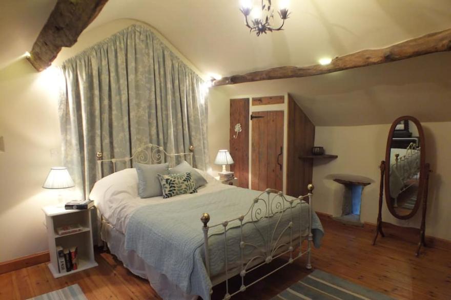 18th Century sandstone cottage with all modern comforts and old world charm.