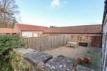 THE DOWER HOUSE COTTAGE, with a garden in Kirklington