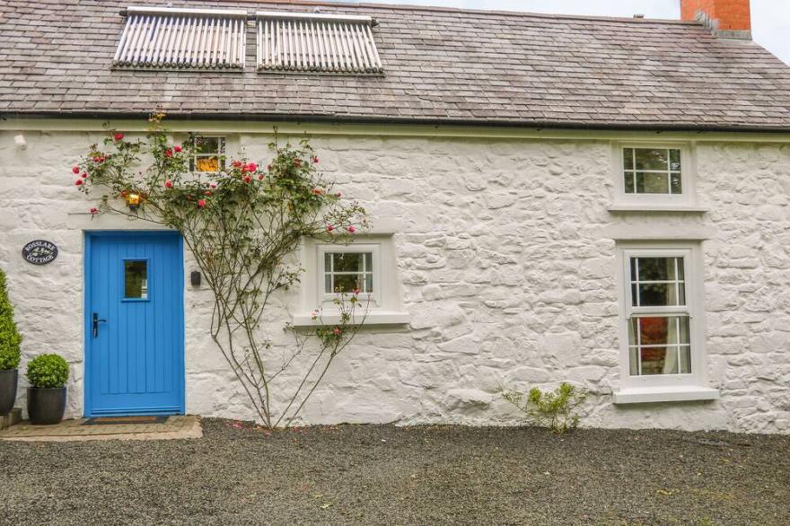 ROSSLARE COTTAGE, with open fire in Broughshane