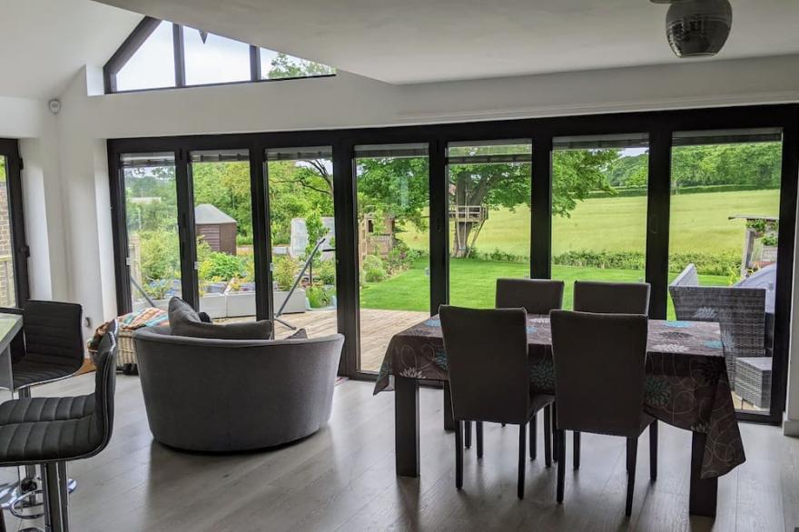 Family home with spacious garden and views in central Sussex