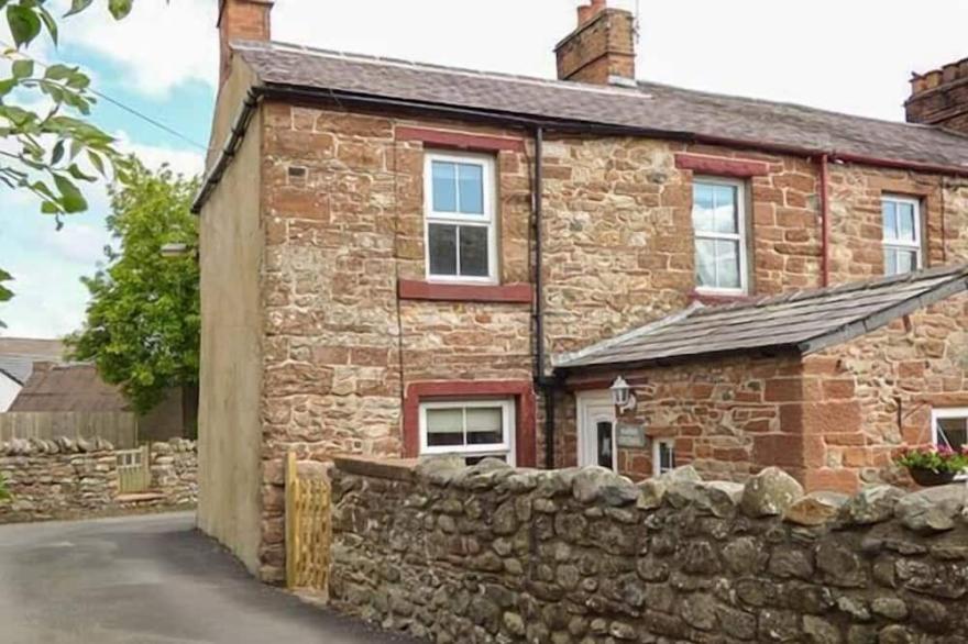 BAKERS COTTAGE, pet friendly, with open fire in Kirkby Thore