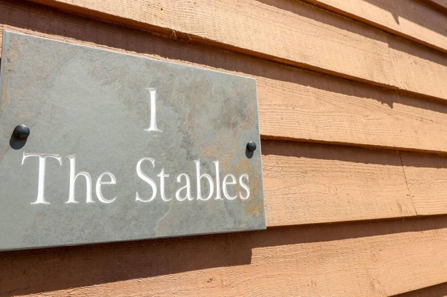 1 THE STABLES, with a garden in Ryde