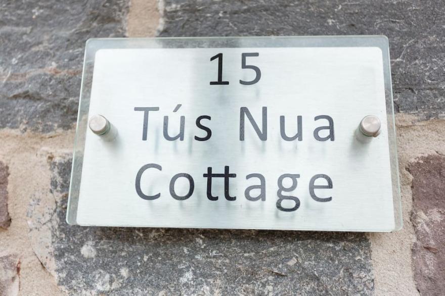 TUS NUA COTTAGE, family friendly, with a garden in Carhampton