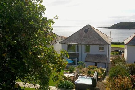 The View has stunning Sea Views, 100m to the beach, Hot Tub, Parking+EV Charger