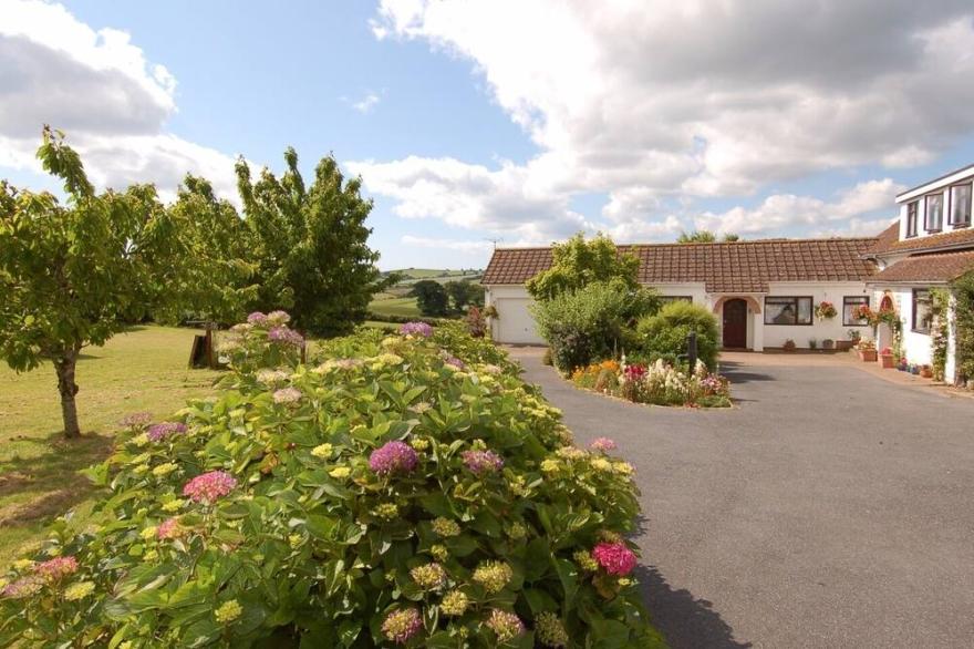 LITTLE WAYCROFT, with a garden in Dawlish Warren