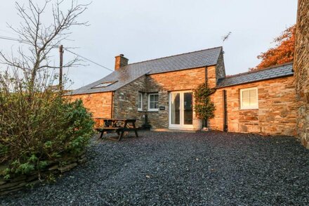 GARTH MORTHIN THE STABLES, pet friendly, with open fire in Porthmadog