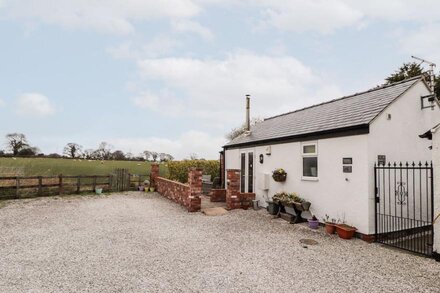 THE OLD STABLE, with open fire in Mold